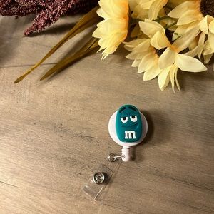 Green M&M Badge Reel